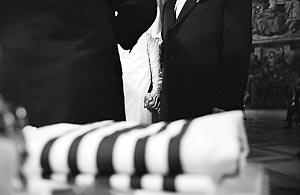 Holding hands under the Chuppah